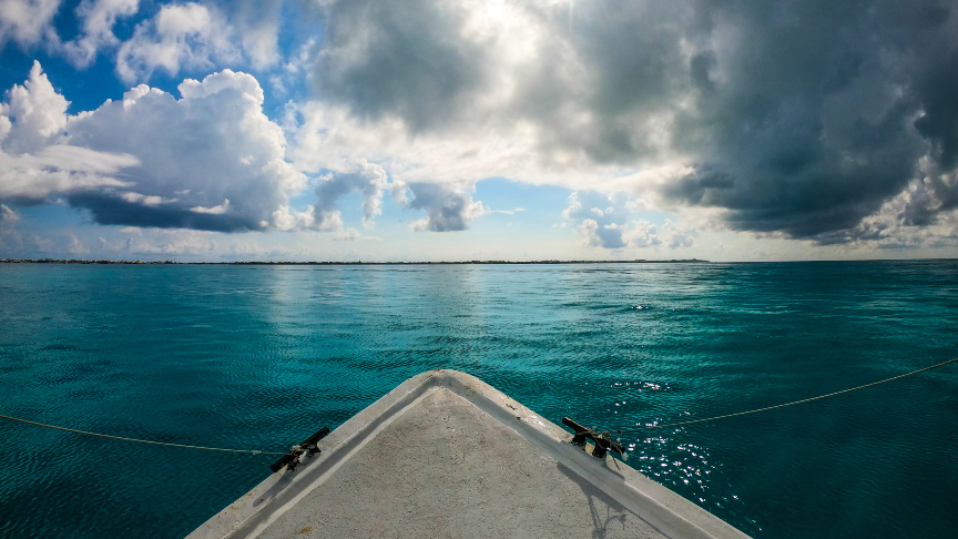 beautiful blue calm water from the boat at isla mujeres, mexico