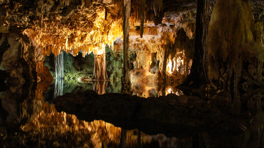 Underground cave, reflections, swimming in a cenote, snorkel