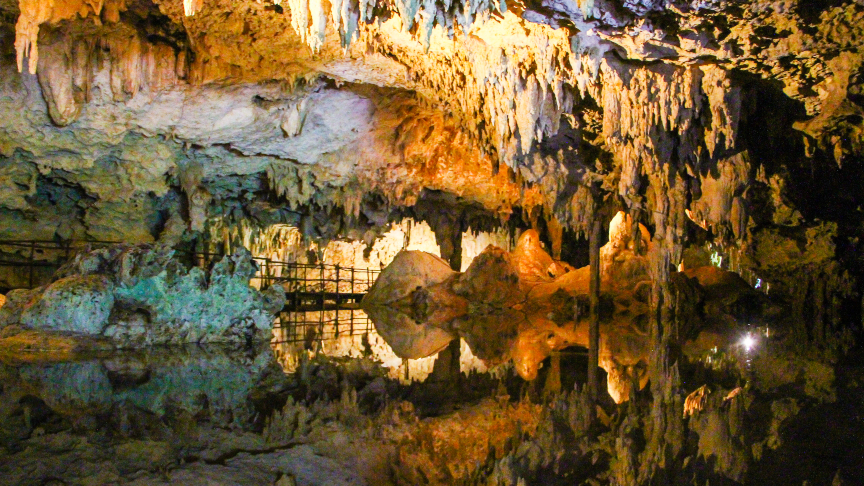 underground cave, swimming in a cenote, snorkel, mirror reflection