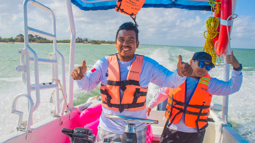 Our lovely captain and sailor of our boat at our Holbox tour