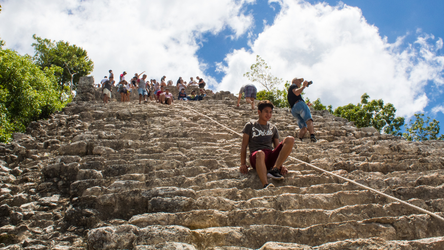 climbing the Nohoch Mul pyramid in Coba