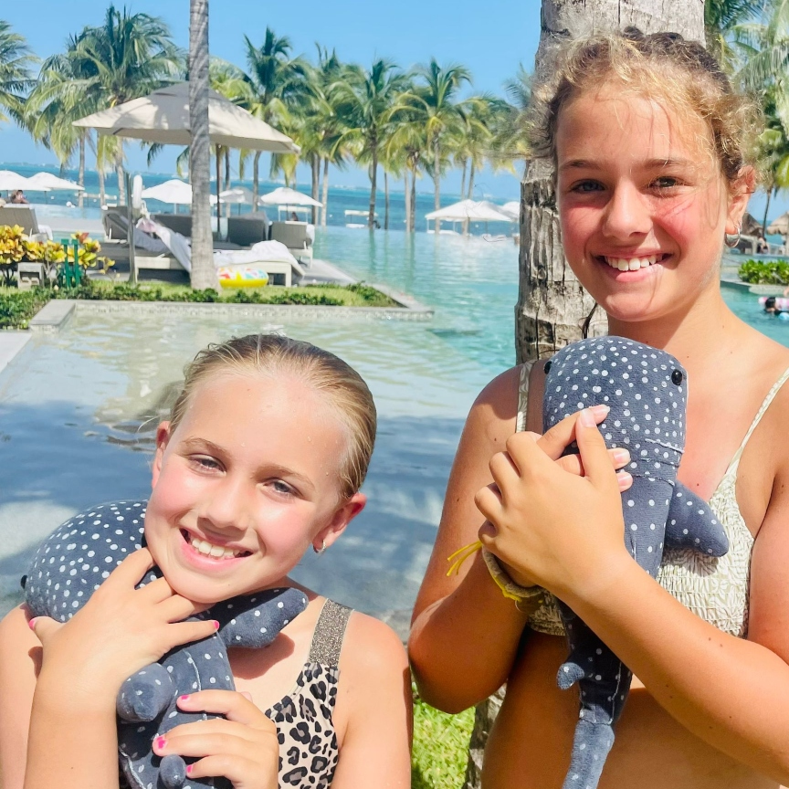 Girls very happy with their whale shark plushie